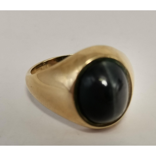 558A - A gent's 9 carat gold banded hardstone cabochon signet ring, hallmarked 375, ring size S; together w... 