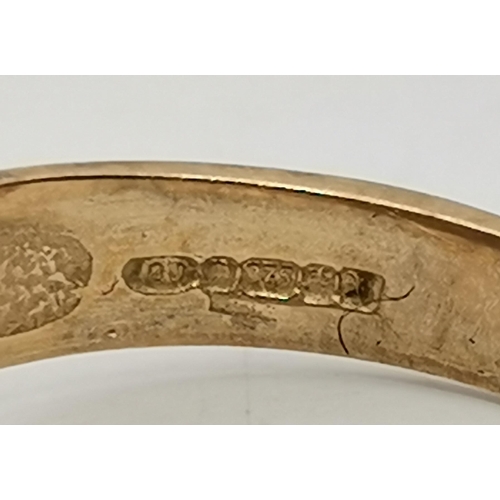 558A - A gent's 9 carat gold banded hardstone cabochon signet ring, hallmarked 375, ring size S; together w... 