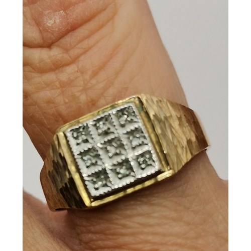 558A - A gent's 9 carat gold banded hardstone cabochon signet ring, hallmarked 375, ring size S; together w... 