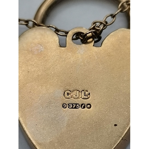 559 - ALL JEWELLERY AND WATCHES ONLY ON SITE FOR VIEW DAYS
A substantial multi-sovereign 9 carat gold char... 