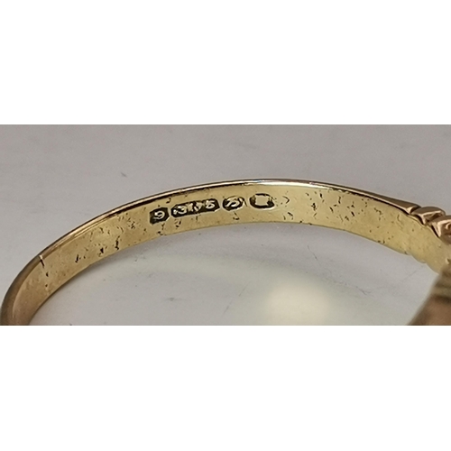 559A - Three 9 carat gold garnet solitaire rings, each with a claw-mounted stone, two rectangular and one o... 