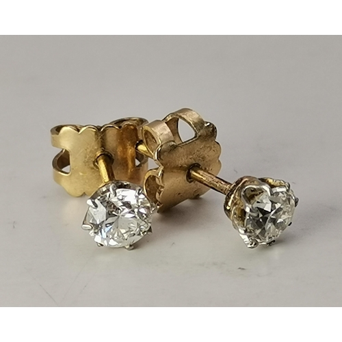 561 - A pair of  mounted round brilliant-cut diamond stud earrings, unmarked. 4mm diameter, 1.1g gross