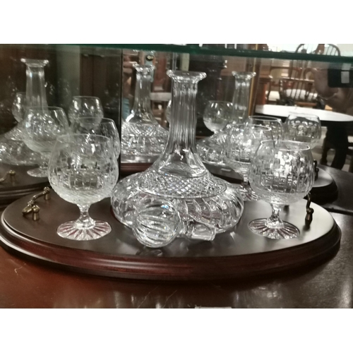 122 - Crystal Decanter complete with stopper and four brandy Glasses on tray possibly Caithness set