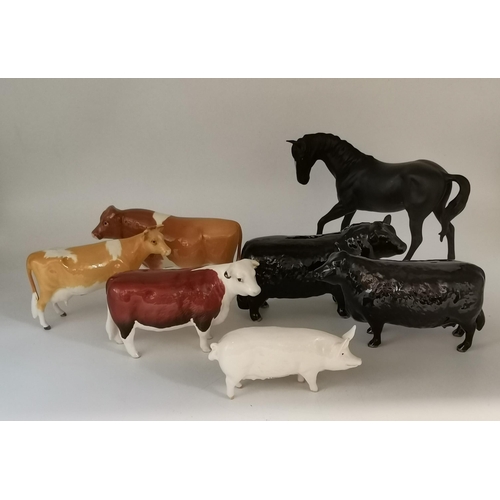 88 - A collection of Beswick animal figures, comprising Angus cow and bull, black gloss, gold backstamp a... 