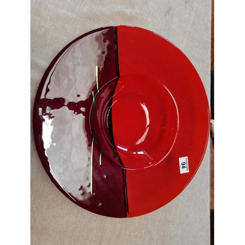 94 - An art glass dish/ bowl in the style of an Asian sunset over the sea 40cm diameter