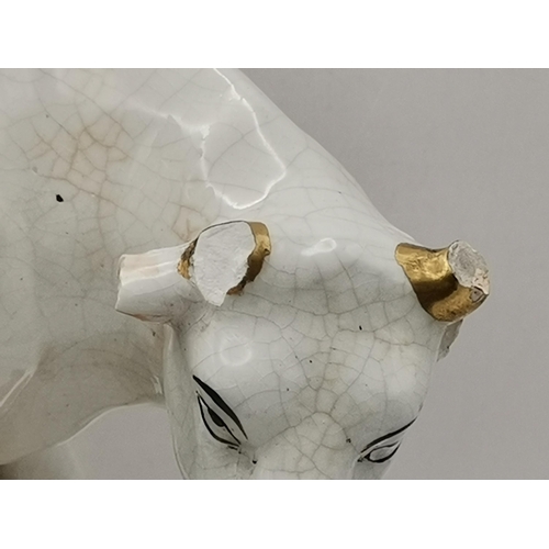 117 - Three Antique Staffordshire figurines - Flatback Highlander Couple with Clock H35cm, Large flatbacke... 