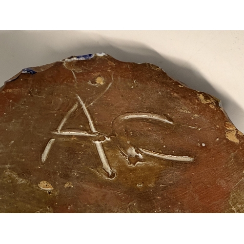 16 - A stoneware figure of a nun, possibly Portuguese, mark on base AC. Approx. 38cm high