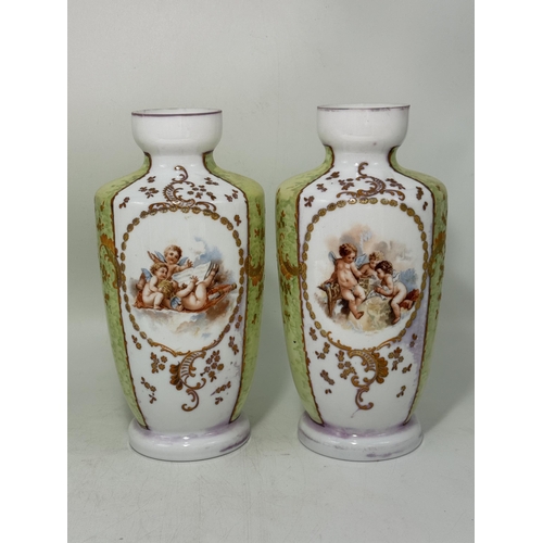 22 - An opaline glass garniture, comprising a large vase and cover together with two smaller vases, each ... 