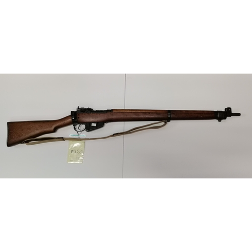 65 - An American made Lee Enfield No.4 bolt action .303 rifle, MK1/3(F)FTR, 1953, serial no. OC19721, sta... 