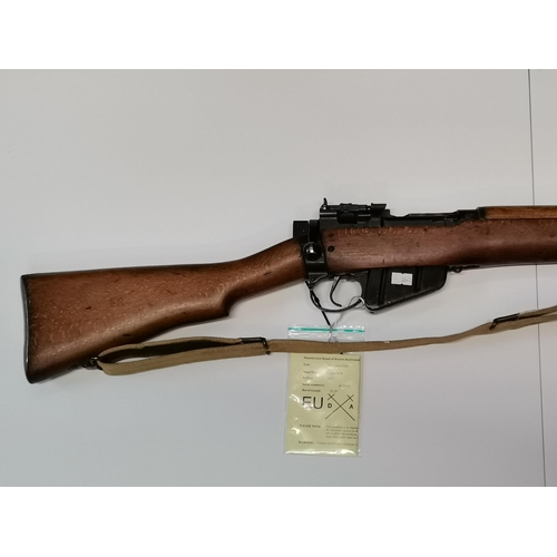 65 - An American made Lee Enfield No.4 bolt action .303 rifle, MK1/3(F)FTR, 1953, serial no. OC19721, sta... 