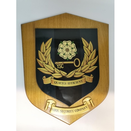 66 - York Security Company, a large wall-hanging shield, the central plaque sign-written with the Yorkshi... 