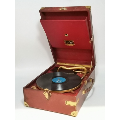 68 - A vintage HMV portable gramophone, in red leather case with gilt-metal fittings, corner spin-tray wi... 