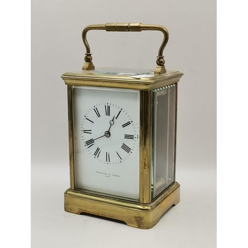 73 - A brass carriage clock made by Rappord Est. 1898 plus a Mathew Norman London brass carriage clock