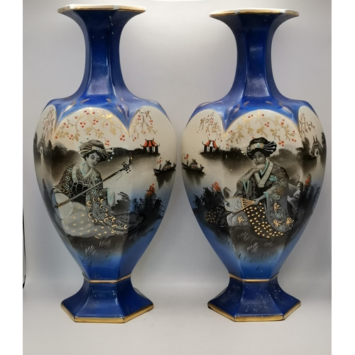 82 - A Pair of cobalt Blue Mantel Vases with hand painted Japanese water scene with Geisha girl marked to... 