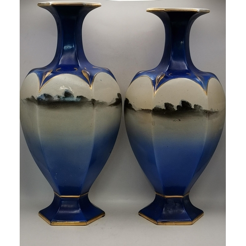 82 - A Pair of cobalt Blue Mantel Vases with hand painted Japanese water scene with Geisha girl marked to... 