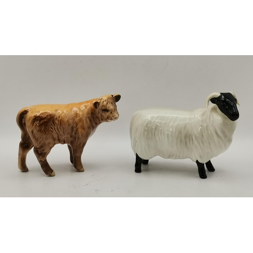 91 - A collection of  figurines including Beswick, Dartmouth pottery etc