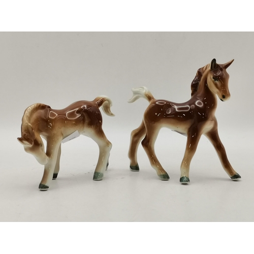 91 - A collection of  figurines including Beswick, Dartmouth pottery etc