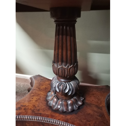 634 - A very good quality William IV burr yew wood games table with lion paw feet and highly decorative ce... 