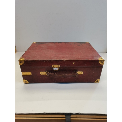 68 - A vintage HMV portable gramophone, in red leather case with gilt-metal fittings, corner spin-tray wi... 