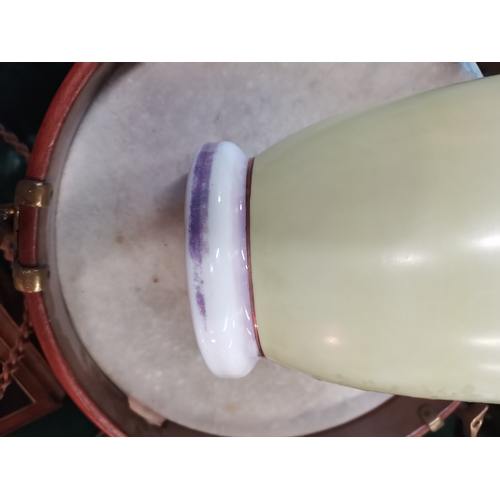 22 - An opaline glass garniture, comprising a large vase and cover together with two smaller vases, each ... 