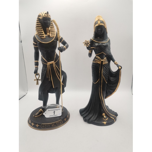 Wedgwood Egyptian 'Legends of the Nile': Tutankhamun 'The Boy-King' figure, black porcelain with gilt decoration, limited edition 166/5000; together with Cleopatra figure, black porcelain with gilt decoration, limited edition 8233/9500, on a circular wooden base. (2) First 23.5cm high( ex condition )