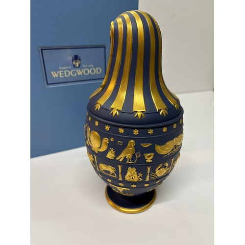 4 - A 'Genius of Wedgwood' Egyptian Revival canopic vase, 1997, Portland blue Jasperware with gilded bas... 