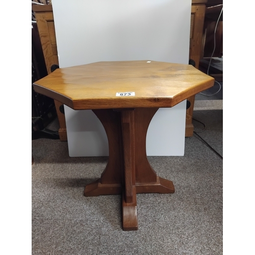 873 - An octagonal oak Squirrel man side table 45cm diameter