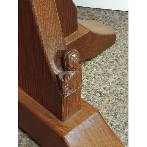 873 - An octagonal oak Squirrel man side table 45cm diameter
