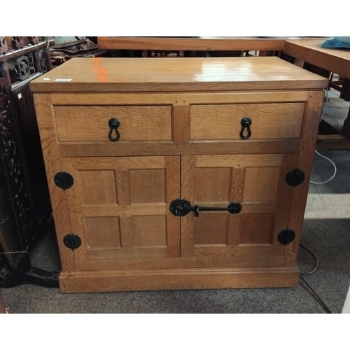 A Yorkshire oak cupboard with 2 drawers and cupboards below 75cm x 45cm x 70cm ( Mouseman interest )