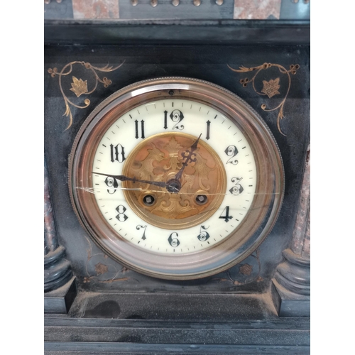 10 - Antique stone and marble renaissance revival mantel clock Length 46cm Height 35cm (damage to glass)