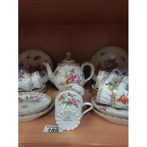 189 - Vintage Dresden Tea set featuring classic Swirled body and ornately decorated with flora bouquets an... 