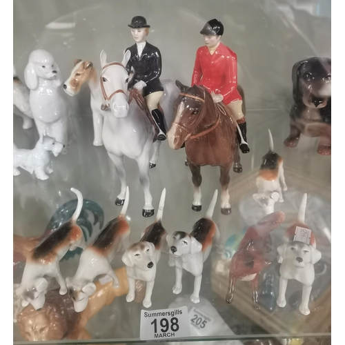 198 - Beswick Huntsman on Bay Horse, Royal Doulton Huntswomen on grey Horse and 6 Hounds plus a Fox