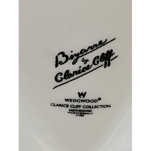 227 - A Clarice Cliff Sugar bowl and jug in Bizarre pattern both in original box