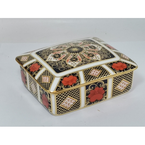 259 - Four Pieces of Crown Derby - Lidded trinket box, Lighter, Old Imari Demitasse Cup and Old Imari Love... 