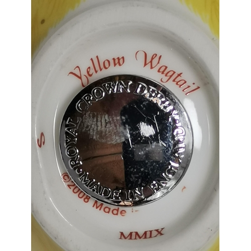 287 - Crown Derby Yellow Wagtail and Crown Derby Coaltit paperweights both with silver stoppers