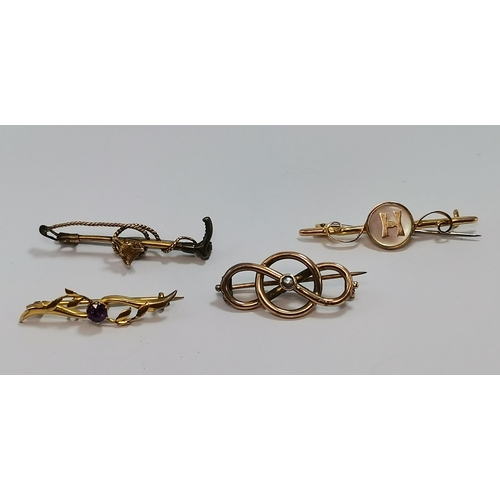 589 - Four assorted 9 carat gold bar brooches, comprising a fox mask and riding crop; a mother-of-pearl di... 