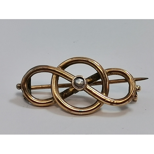 589 - Four assorted 9 carat gold bar brooches, comprising a fox mask and riding crop; a mother-of-pearl di... 