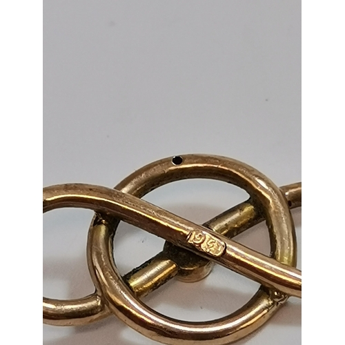 589 - Four assorted 9 carat gold bar brooches, comprising a fox mask and riding crop; a mother-of-pearl di... 