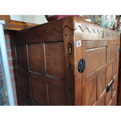 808 - A  very rare early mouseman  oak panelled double wardrobe, beautifully patinated with each wardrobe ... 