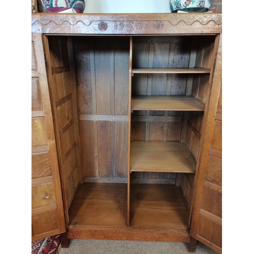 808 - A  very rare early mouseman  oak panelled double wardrobe, beautifully patinated with each wardrobe ... 