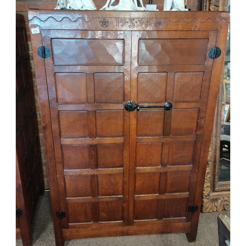 809 - A  very rare early mouseman  oak panelled double wardrobe, beautifully patinated with each wardrobe ... 