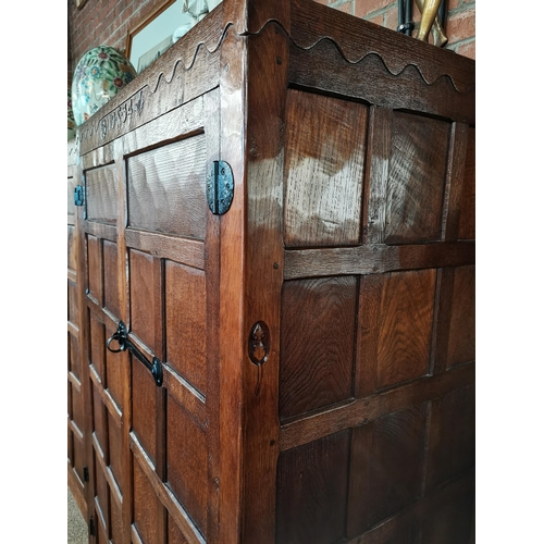 809 - A  very rare early mouseman  oak panelled double wardrobe, beautifully patinated with each wardrobe ... 