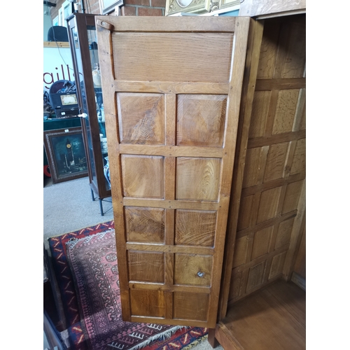 808 - A  very rare early mouseman  oak panelled double wardrobe, beautifully patinated with each wardrobe ... 