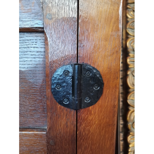 809 - A  very rare early mouseman  oak panelled double wardrobe, beautifully patinated with each wardrobe ... 