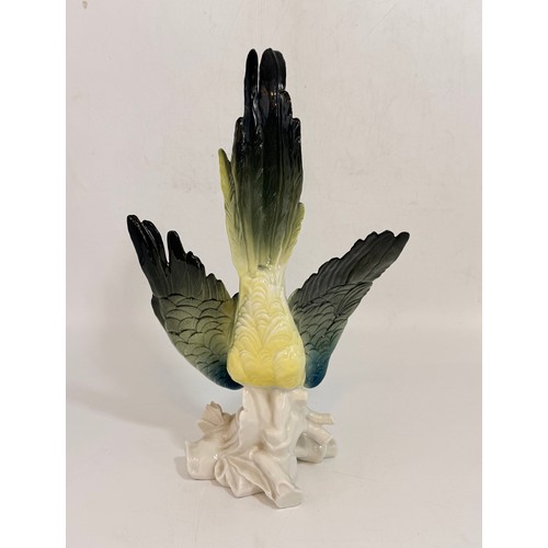  A Karl Ens Porcelain parrot with makers mark to base H38cm