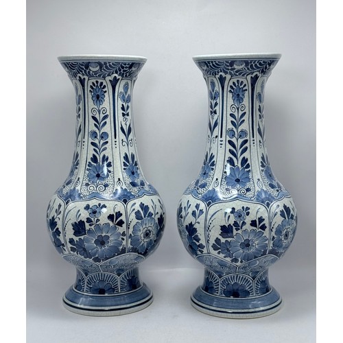 237 - A Pair of Blue and White Delft Vases H26cm