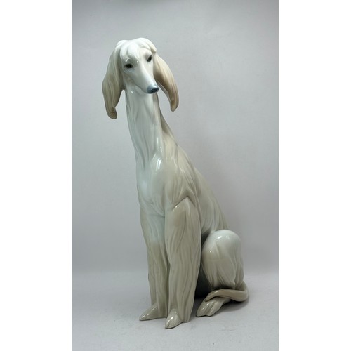  Two Lladro Dog figurines - Blood Hound 1067 plus Afghan Hound 1069 sculptured by Juan Huerta H30cm
