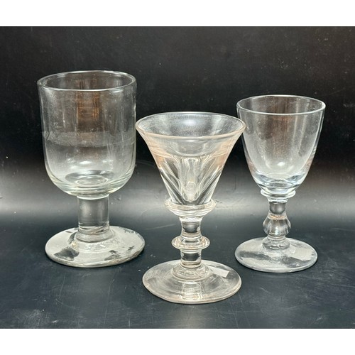  A collection of eight vintage glasses including
Georgian twisted opaque stem wine glasses etc
