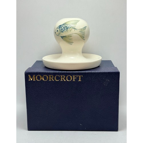  A Moorcroft pottery 'Fish' candlestick holder mark on base Moorcroft H11cm