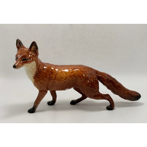 107 - Two Beswick Fox figurines